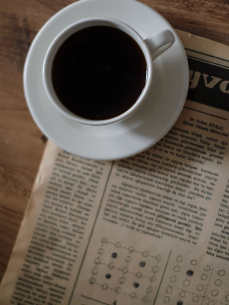 Bound annual volumes of Article Daily editions on archive shelves
